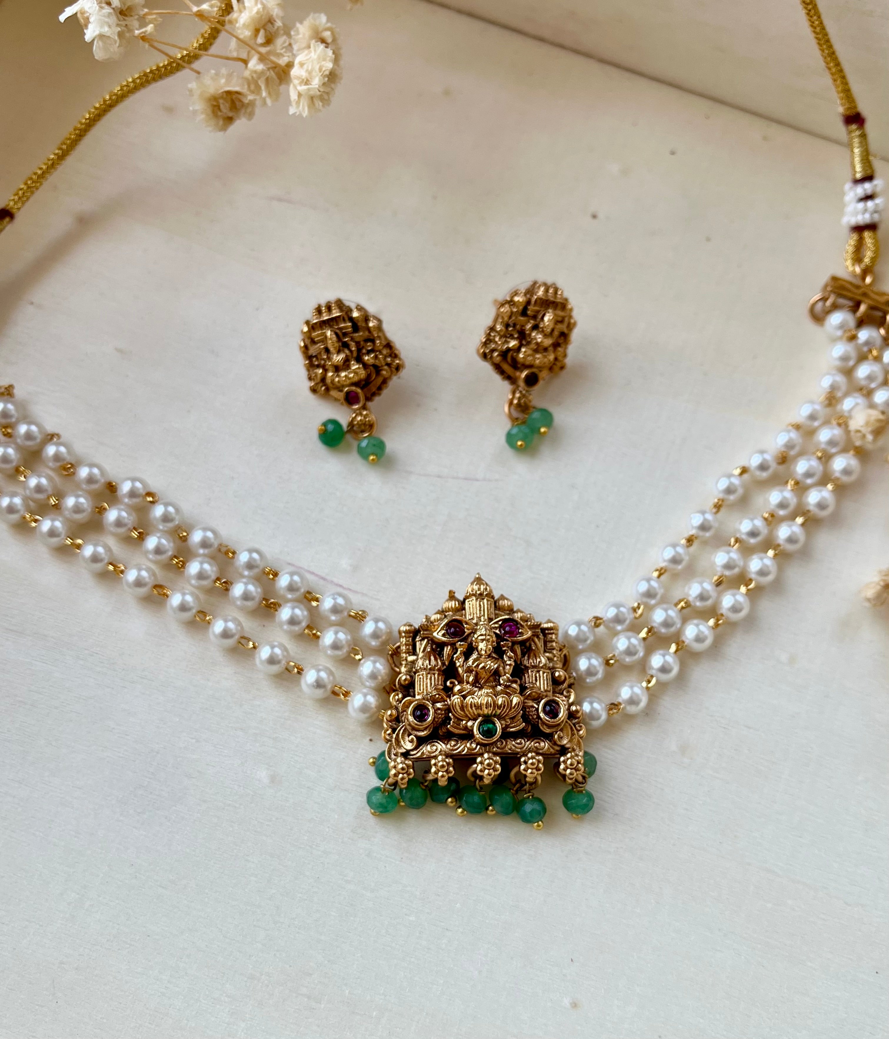 Laxmiji idol and pearl choker
