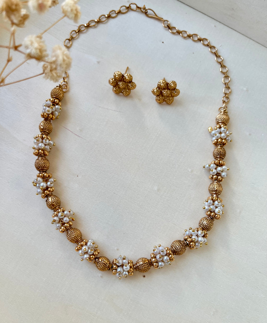 Golden beads and pearl set