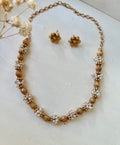 Golden beads and pearl set