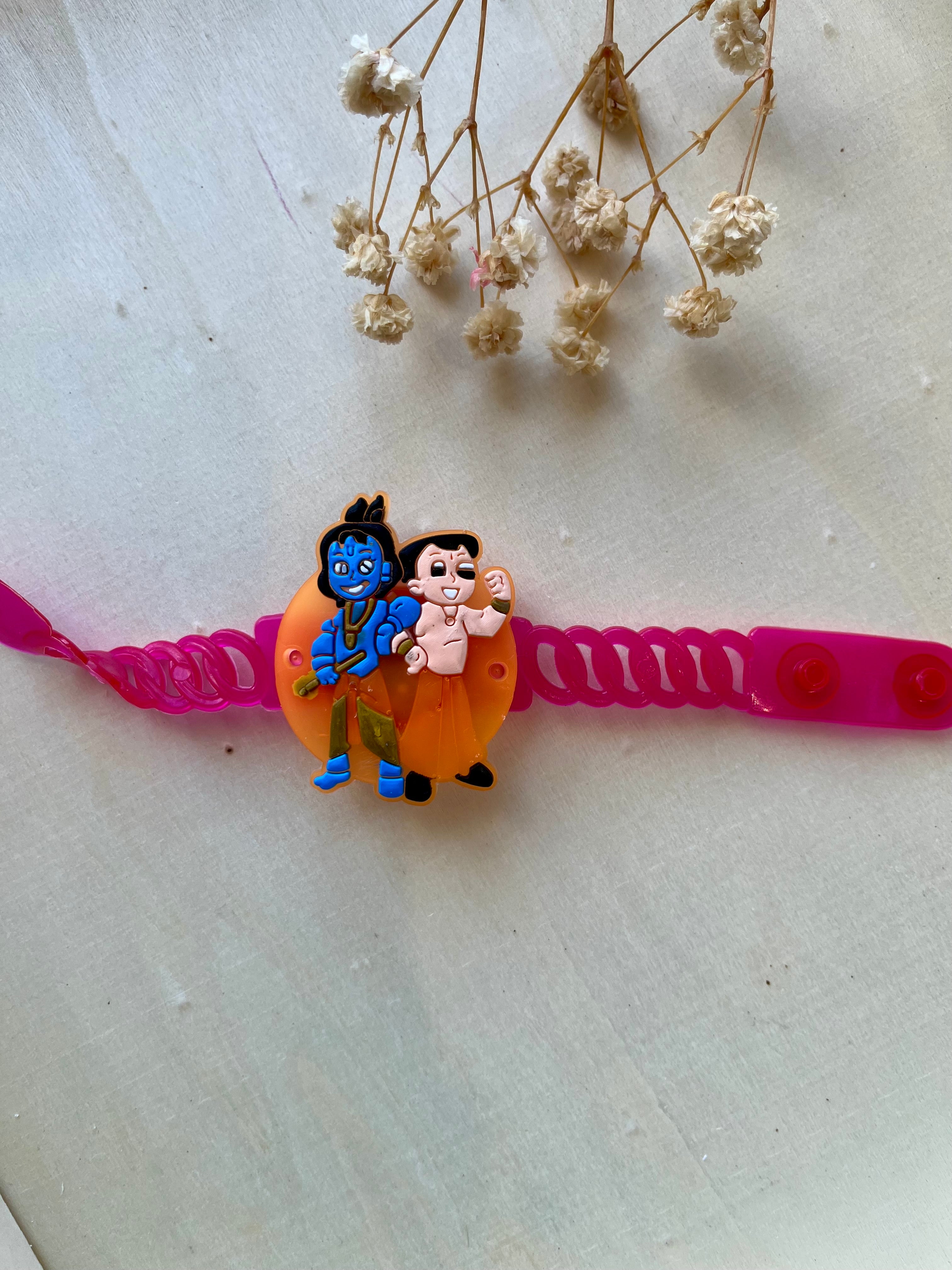 Krishna and bheem Light-Up Rakhi for Kids – Glowing Rubber Band Rakhi | Desi Luxe NZ