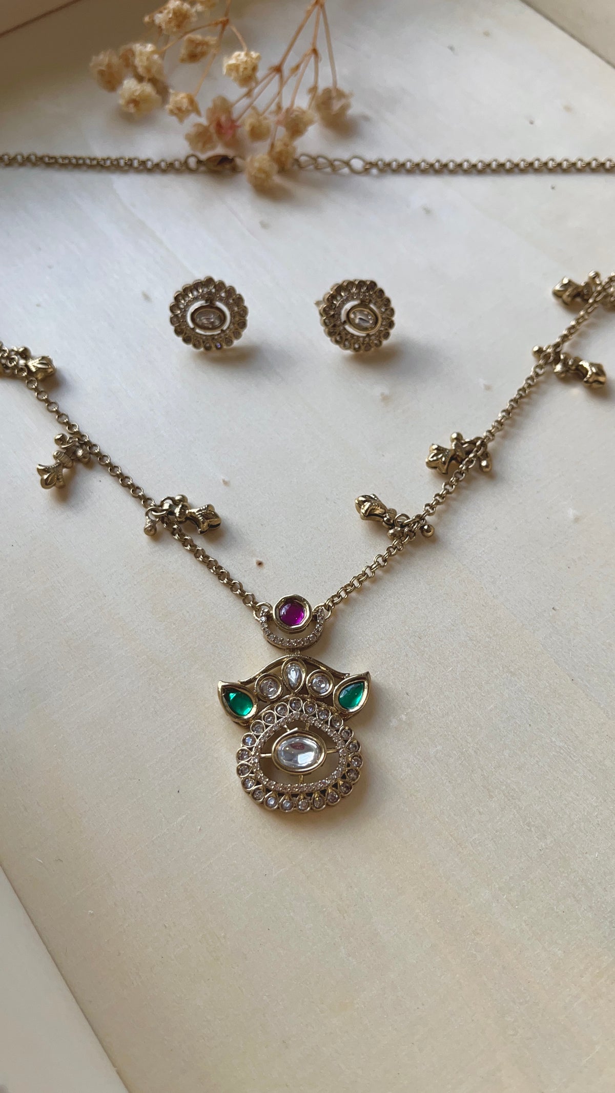 Polki Necklace Set – Antique Gold with Ruby & Emerald Stones