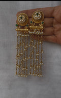Green stone and kundan earrings