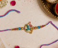 Krishna Peacock Feather Rakhi with Crystal Beads