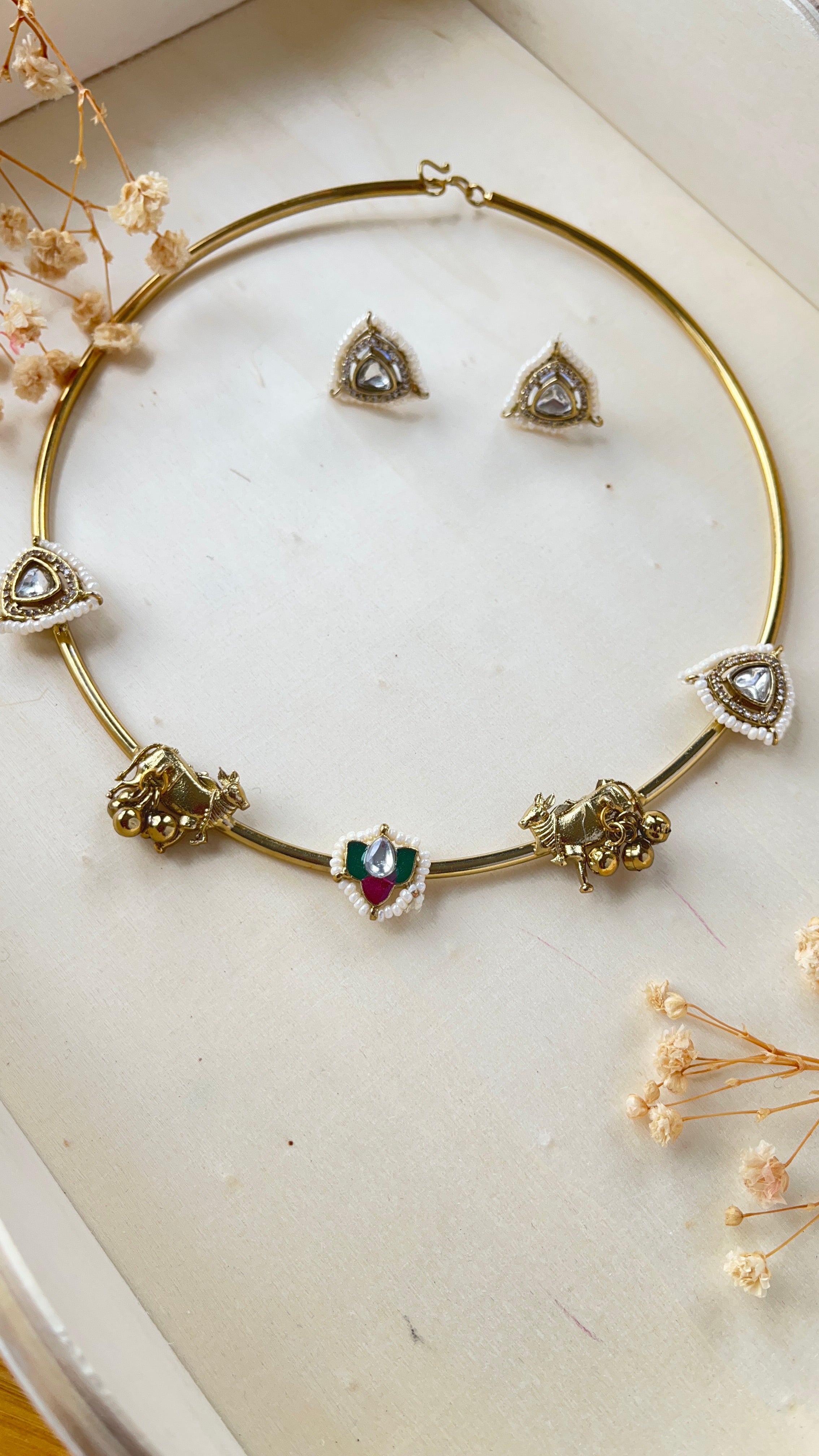 Real Polki stone and meenakari Cow Hasli necklace set