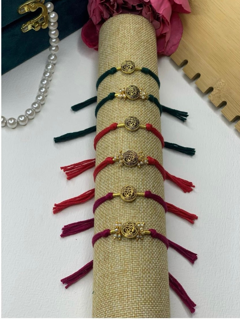 Om couple rakhi pair—Desi Luxe NZ