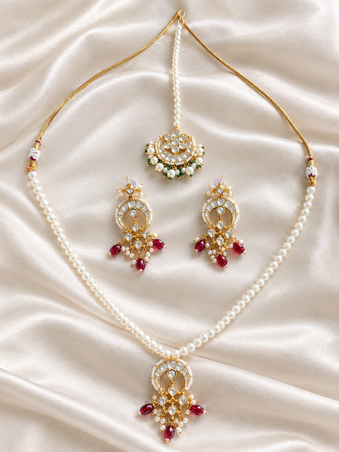 Premium Kundan Pearl Necklace with Matching Tika & Earrings