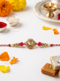 Antique Gold Om Rakhi with Meenakari Pink Enamel Work