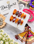 Marigold Maroon Press-On Nails | Hand-Painted Orange & Maroon Navratri Nails with Cowrie Charms
