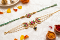 Lotus kundan couple rakhi pair—Desi Luxe NZ