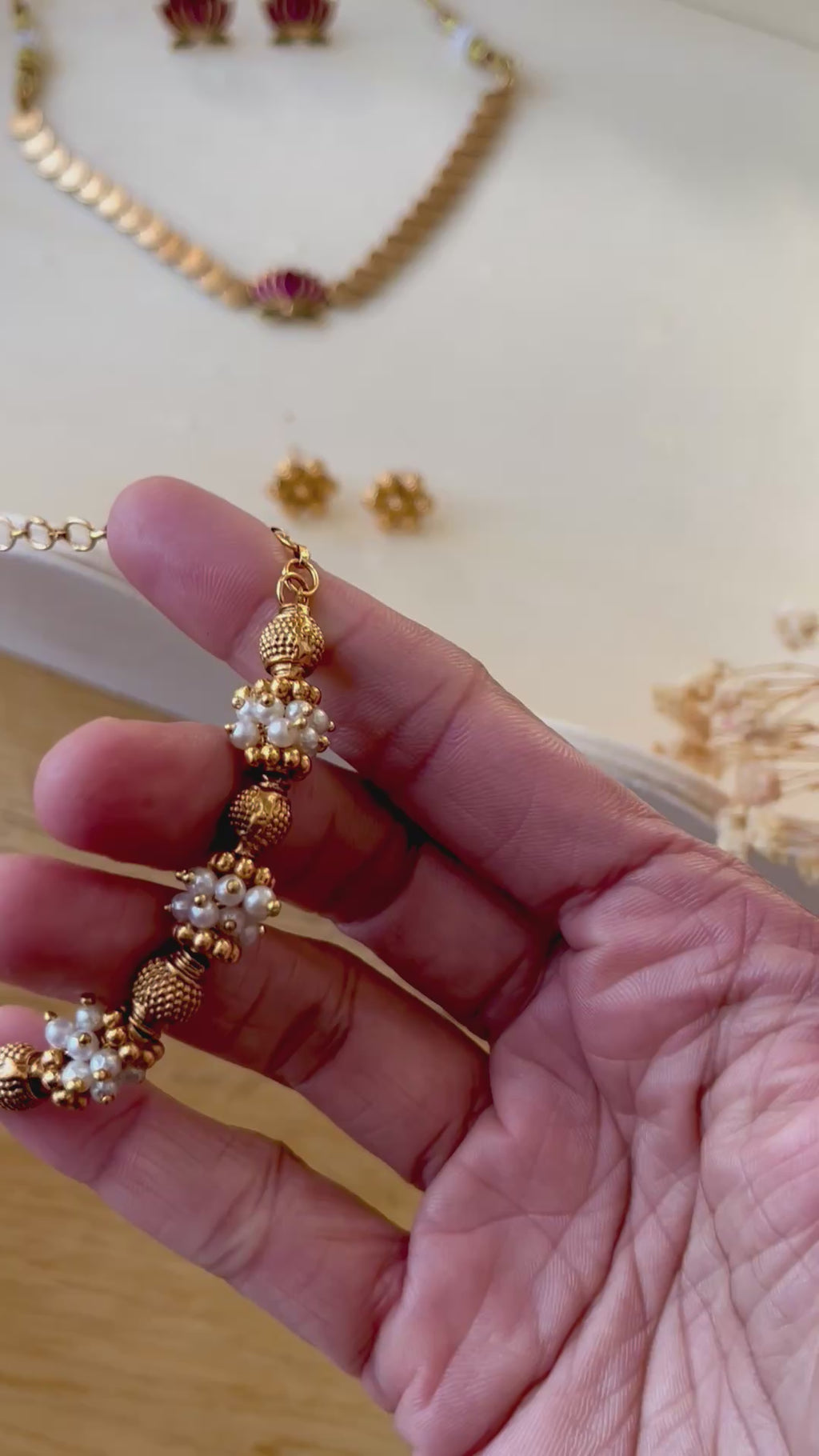 Golden beads and pearl set